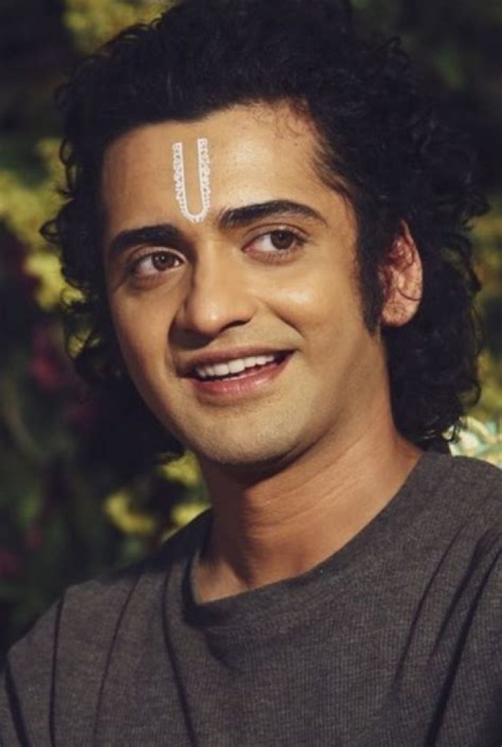 Did Lord Krishna have curly hair?