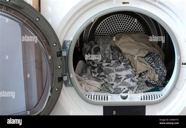 How do I stop my duvet cover going into the ball in the tumble dryer?