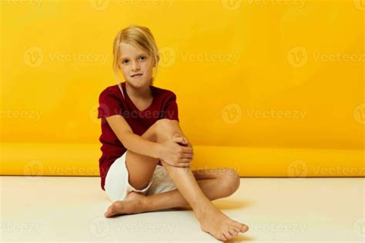 Why do girls lay on the floor with their legs up?
