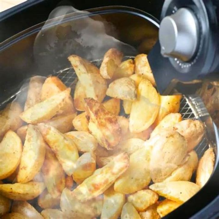 Why does my air fryer smoke when I cook hamburgers?